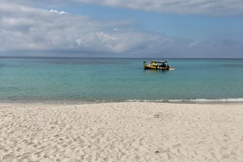 View of Capo Di Muro beach during a private VTC transfer to Porticcio